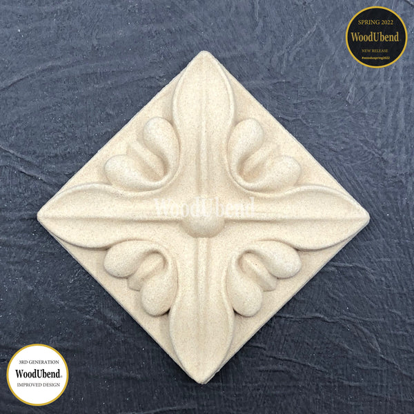A decorative molding, no WUB207.6.  The molding features a square with intricate centre piece design, adding a beautiful and sophisticated touch when added to a piece of furniture. WUB207.6 is part of the JMM – Jonathan Mark Mendes Collection. Measurement 7x7x0.7cm