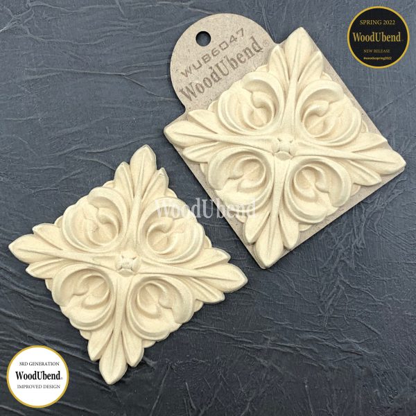 A decorative molding, no WUB6047.  The molding features a square with intricate centre piece design, adding a beautiful and sophisticated touch when added to a piece of furniture. Comes in a pack of two. Measures 9x9x1 cm.